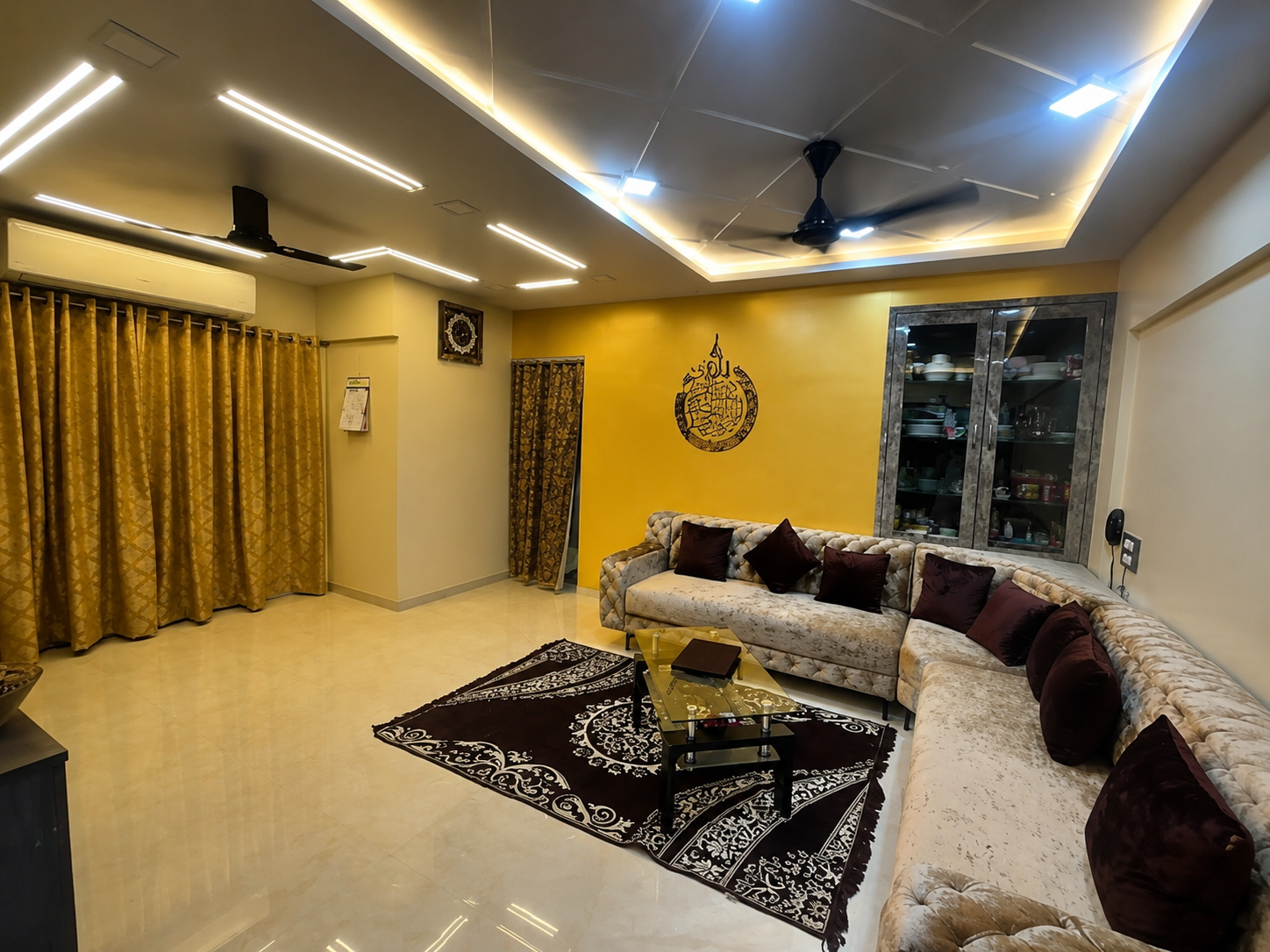 Warm residential living room designed by MEMAAR